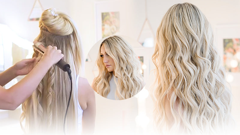 A stylist uses a flat iron to curl a section of long blonde hair on a model, working near the crown in a bright salon setting. Featured image for blog post: A Beginner's Guide to Curling Your Hair With a Flat Iron