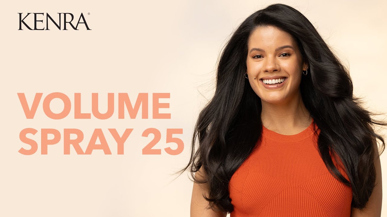 Woman with voluminous hair smiling, with 'Kenra Volume Spray 25' text on a beige background